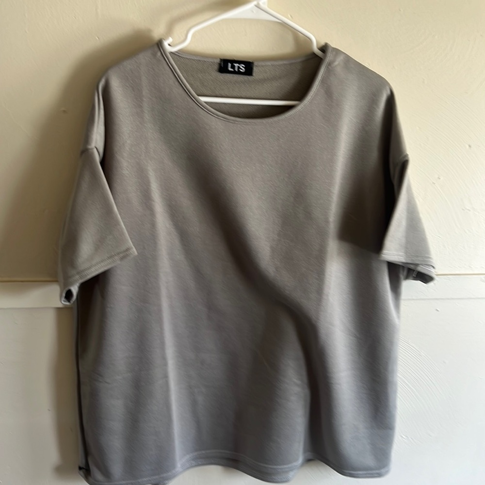 Short sleeve size 18-20 LTS sweat shirt like top. Looks like a olive color